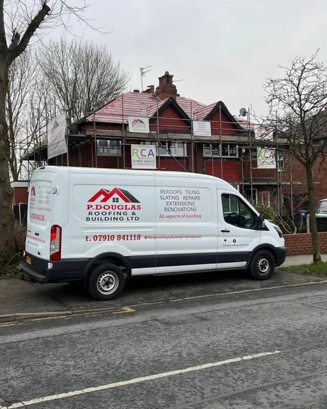 The van outside a completed job