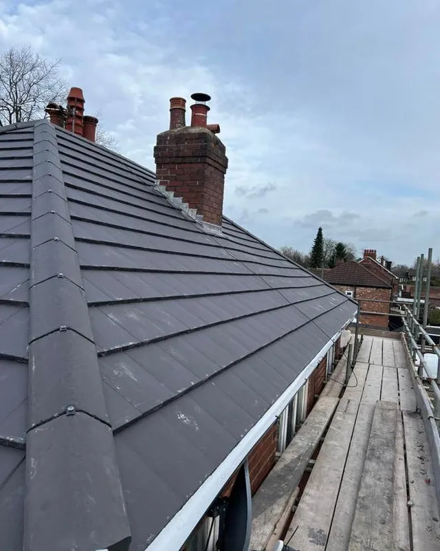 New ridge and tiles from the scaffold