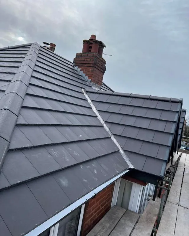 Chimney and new tiles on a terrace