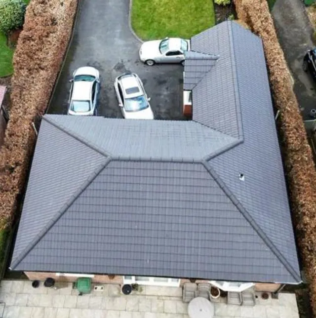 Hipped roof completed in grey